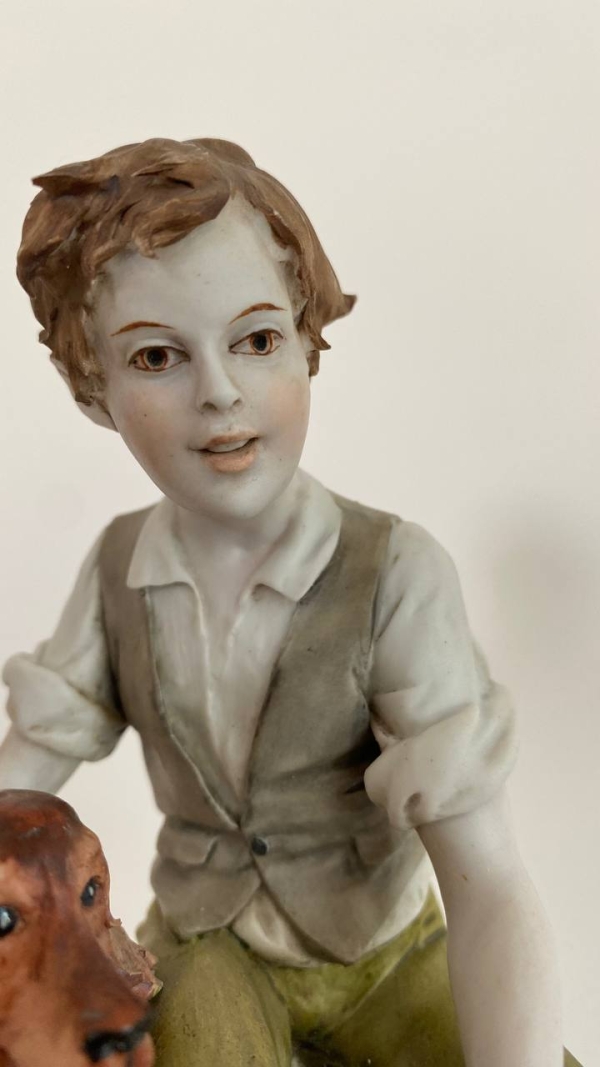 “Boy and Dog” Figurine by Luigi Benacchio