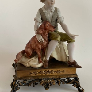 “Boy and Dog” Figurine by Luigi Benacchio